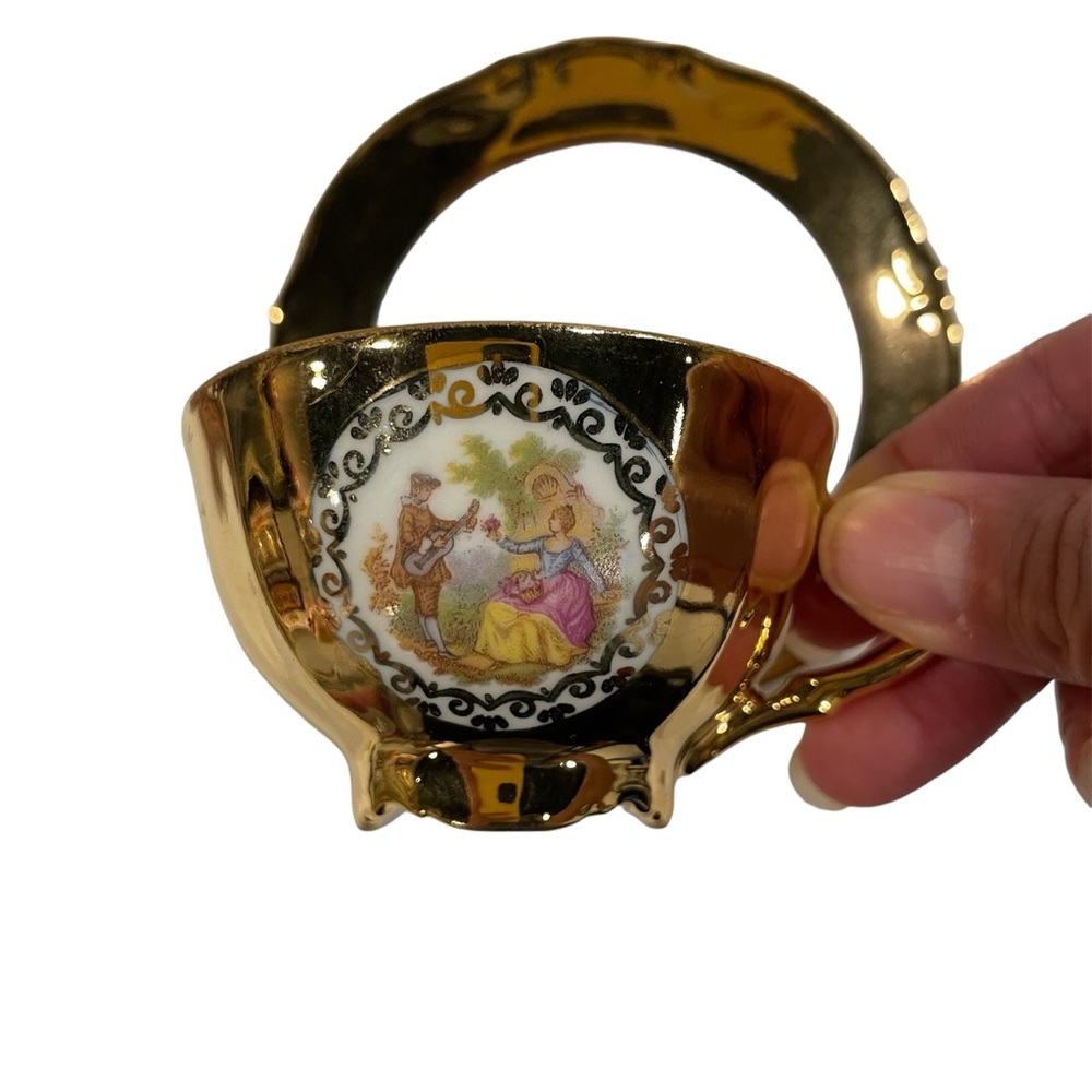 Adorable Bavaria 24k gold painted teacup and saucer hand made porcelain baroque